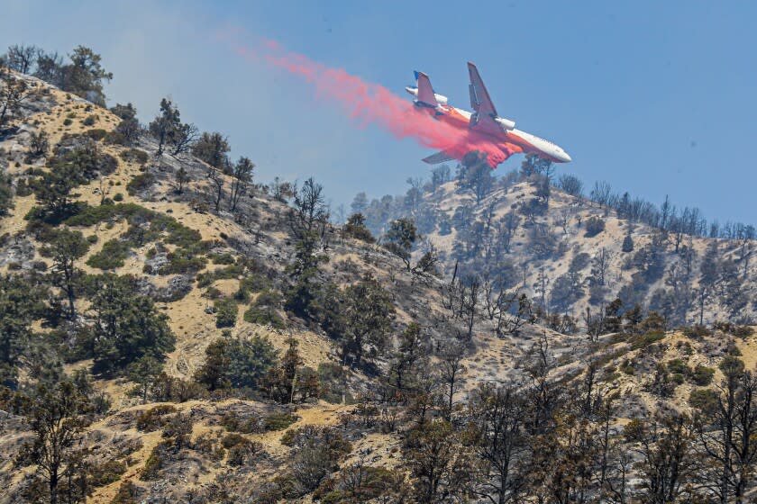 Wrightwood, CA, Monday, June 13, 2022 - A 10 Tanker DC-10 jet delivers fire retardant as crews continue to battle the Sheep Fire. (Robert Gauthier/Los Angeles Times)