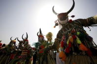 Traditional dancers perform outside the parliament before Sudan's President Omar Hassan al-Bashir takes an oath during his presidential inauguration ceremony for a new term at the National Assembly in Omdurman, June 2, 2015. REUTERS/Mohamed Nureldin Abdallah