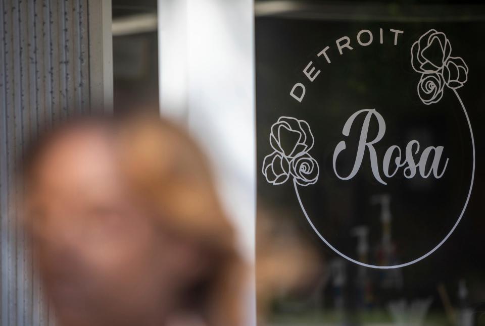 Charity Dean, the head of the Metro Detroit Black Business Alliance, sits inside Rosa in Detroit on Aug. 10, 2022. In memory of her great grandmother, Dean recently opened Rosa, a coffee shop in the Grandmont Rosedale neighborhood.