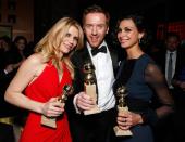 IMAGE DISTRIBUTED FOR FOX SEARCHLIGHT - From left, actors Claire Danes, Damian Lewis and Morena Baccarin attend the Fox Golden Globes Party on Sunday, January 13, 2013, in Beverly Hills, Calif. (Photo by Todd Williamson/Invision for Fox Searchlight/AP Images)