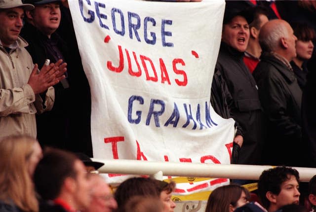 A banner displaying the words George 'Judas' Graham 