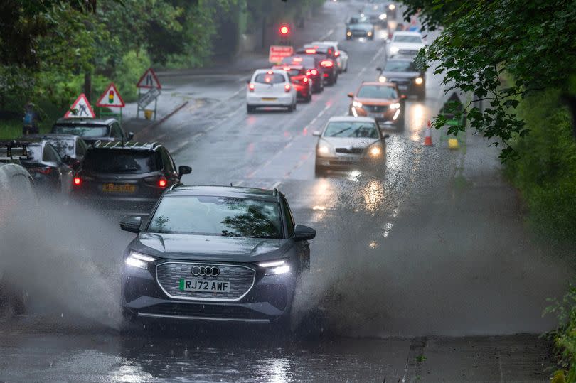 Manchester Road in Wilmslow is starting to flood