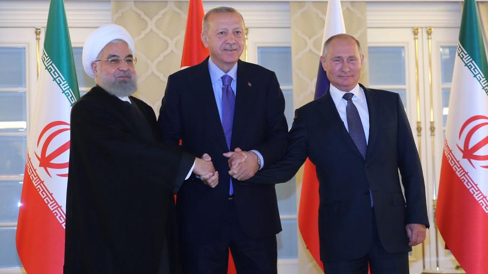 Irans Präsident Ruhani neben Gastgeber  Erdogan und seinem russischen Amtskollegen Putin. Foto: arman/Iranian Presidency