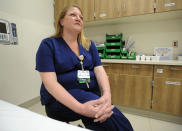 Registered nurse Heather Agee is shown in a treatment room at Thomasville Regional Medical Center in Thomasville, Ala., on Tuesday, May 3, 2022. The hospital is among three in the nation that say they are missing out on federal pandemic relief money because they opened during or shortly before the COVID-19 crisis began. (AP Photo/Jay Reeves)