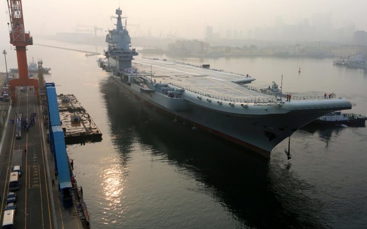 China's first domestically developed aircraft carrier departs Dalian - REUTERS