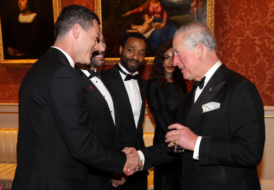 Luke Evans speaks with Prince Charles, Prince of Wales during a dinner to celebrate 'The Princes Trust' at Buckingham Palace on March 12, 2019 in London, England. The Prince of Wales, President, The Prince’s Trust Group hosted a  dinner for donors, supporters and ambassadors of Prince’s Trust International. (Photo by Chris Jackson - WPA Pool/Getty Images)