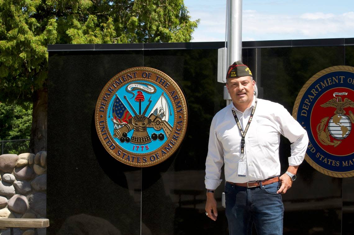 Paul Herrera poses in front of the Puyallup Tribal Veterans Memorial. Herrera is the first person from Puyallup to be elected Washington State commander of the Veterans of Foreign Wars organization.