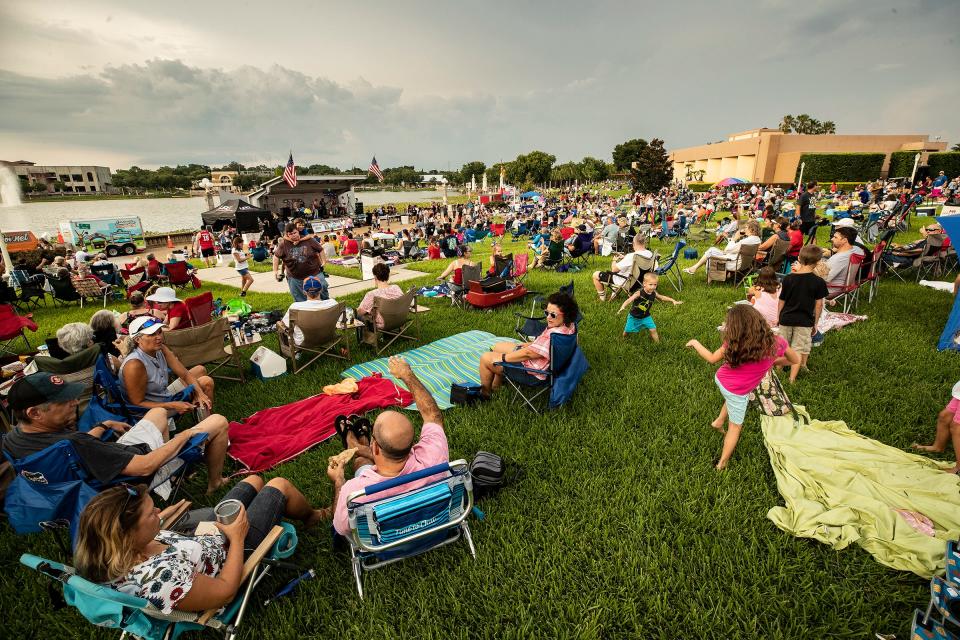 A crowd listens to music during Lakeland's Red White & Kaboom celebration in 2019.