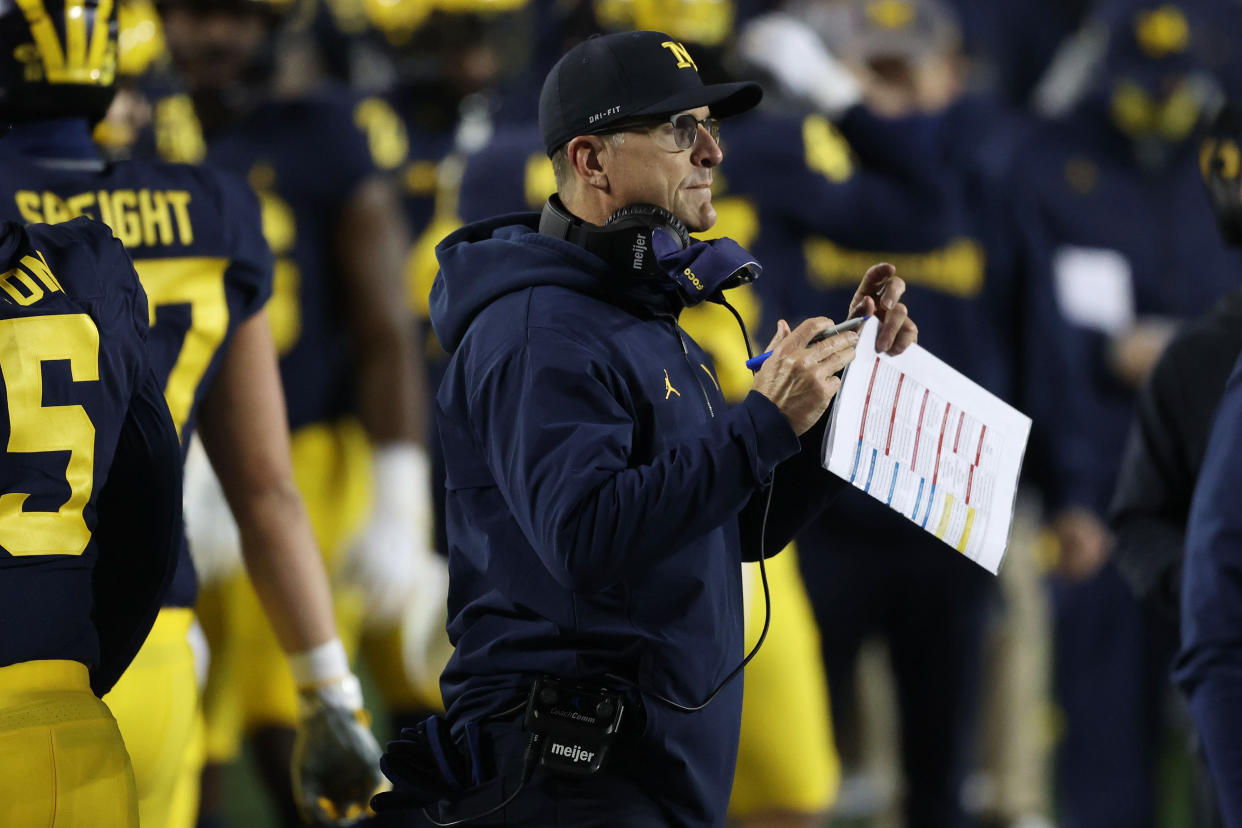 ANN ARBOR, MICHIGAN - NOVEMBER 14: Head coach Jim Harbaugh looks on while playing the Wisconsin Badgers at Michigan Stadium on November 14, 2020 in Ann Arbor, Michigan. (Photo by Gregory Shamus/Getty Images)