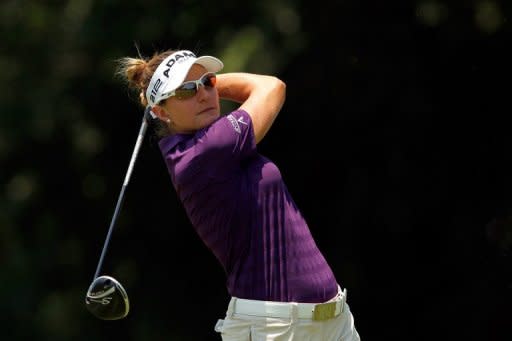 Brittany Lang hits a tee shot on the 7th hole during the second round of the LPGA Tour's NW Arkansas Classic on June 30. Lang is tied with LPGA Championship winner Feng Shanshan of China (70), Katie Futcher (67), Ryann O'Toole (68) and Ai Miyazato (68)