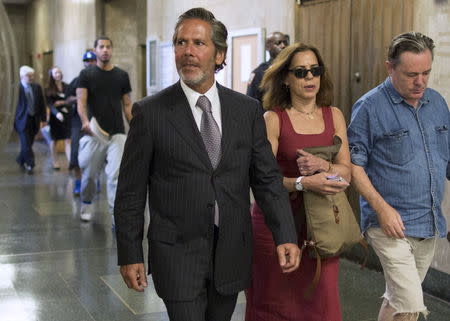 Stephen DiCarmine (L), former executive director for law firm Dewey and Leboeuf, exits the courtroom at Manhattan Criminal Court in New York, September 16, 2015. REUTERS/Brendan McDermid