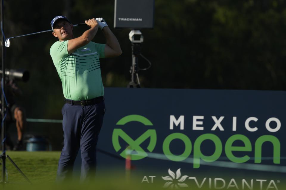 Padraig Harrington, of Ireland, watches his tee shot on the 11th tee during the first round of the Mexico Open golf tournament in Puerto Vallarta, Mexico, Thursday, Feb. 22, 2024. (AP Photo/Fernando Llano)