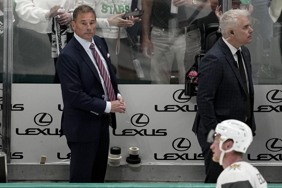 Vegas Golden Knights head coach Bruce Cassidy, left rear, and a member of his staff leave the bench after the team's 3-2 loss against the Dallas Stars in Game 5 of an NHL hockey Stanley Cup first-round playoff series in Dallas, Wednesday, May 1, 2024. (AP Photo/Tony Gutierrez)