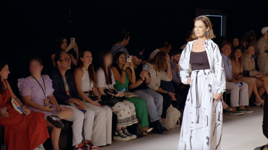 Julia Lemigova poses in a black and white set on a runway in The Real Housewives of Miami 612.