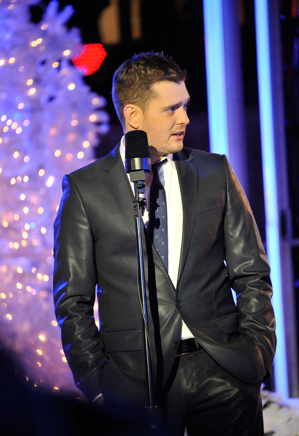 NEW YORK, NY - NOVEMBER 30: Singer Michael Buble performs at the Rockefeller Center Christmas Tree Lighting Party at Rock Center Cafe on November 30, 2011 in New York City. (Photo by Gary Gershoff/Getty Images for NBC)