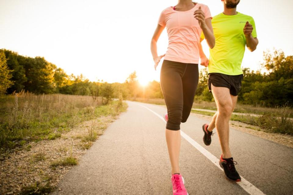 a man and a woman jogging together