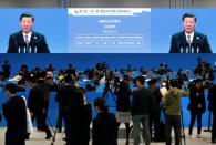 A media center's screen shows Chinese President Xi Jinping delivering a speech at the opening ceremony for the second Belt and Road Forum in Beijing, China, April 26, 2019. REUTERS/Jason Lee