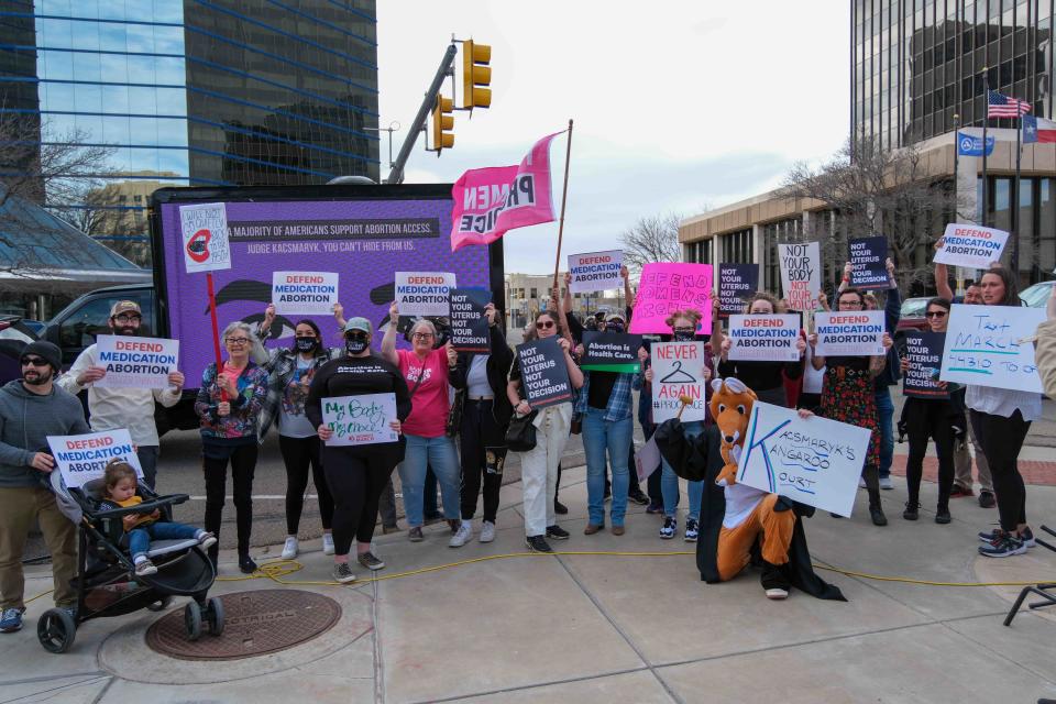Protesters gather across from the U.S. District Court in downtown Amarillo in March in response to a federal hearing taking up the case of medication abortion.