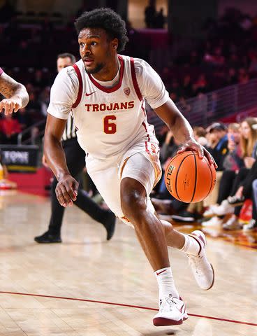 <p>Brian Rothmuller/Icon Sportswire via Getty</p> USC Trojans guard Bronny James (6) drives to the basket during the college basketball game between the Arizona State Sun Devils and the USC Trojans on March 7, 2024 at Galen Center in Los Angeles, CA.