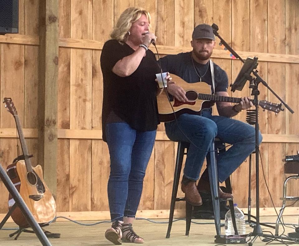 Former North East football star Garrett Owens performs a cover of Fleetwood Mac's "Dreams" with his mother, Mary Jo Neckers, during last weekend's country music festival at Peek'n Peak Resort in Findley Lake, New York. Owens, who also played for the Mercyhurst University and Duquesne University football teams, recently completed his first professional season as a tight end with the XFL's Houston Roughnecks.