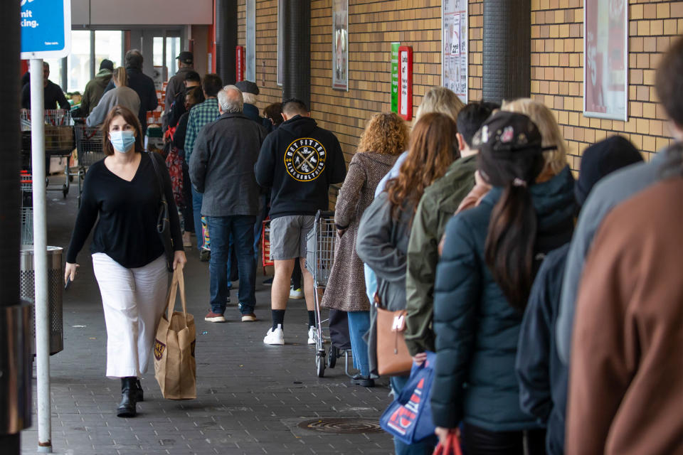 Shoppers lineup to enter a supermarket in Auckland, New Zealand, following the lockdown announcement. Source: New Zealand Herald via AP