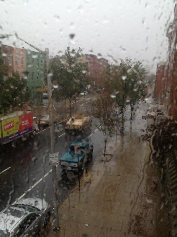 in my my apartment with food, flashlights, and fresh batteries. The National Guard is here for #Sandy. (photo @donnelleley)