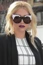 Kesha rocked a fierce purple lip, wavy blonde locks and bold shades at New York Fashion Week earlier this year.