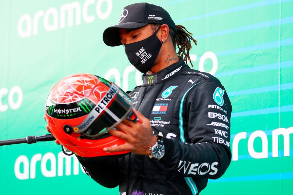 <p>On Dec. 1, Hamilton's Mercedes team<a href="https://edition.cnn.com/2020/12/01/motorsport/lewis-hamilton-coronavirus-uk-gbr-spt-intl/index.html" rel="nofollow noopener" target="_blank" data-ylk="slk:confirmed to CNN;elm:context_link;itc:0;sec:content-canvas" class="link "> confirmed to CNN</a> that the 35-year-old British Formula 1 driver was self-isolating after testing positive, <a href="https://people.com/sports/lewis-hamilton-to-miss-2020-sakhir-grand-prix-after-testing-positive-for-covid/" rel="nofollow noopener" target="_blank" data-ylk="slk:and is only experiencing mild symptoms;elm:context_link;itc:0;sec:content-canvas" class="link ">and is only experiencing mild symptoms</a>.</p> <p>"He is otherwise fit and well, and the entire team sends him its very best wishes for a swift recovery," the team said in a statement.</p> <p>According to Mercedes, Hamilton woke up on Nov. 30 with mild symptoms and later found out he had been exposed to the virus prior to the Bahrain Grand Prix the day before. He had tested negative three times the previous week ahead of the race.</p> <p>In his own social media post, Hamilton wrote that he was "gutted to not be able to race this weekend but my priority is to follow the protocols and advice to protect others."</p> <p>He continued, "I'm really lucky that I feel ok with only mild symptoms and will do my best to stay fit and healthy."</p>