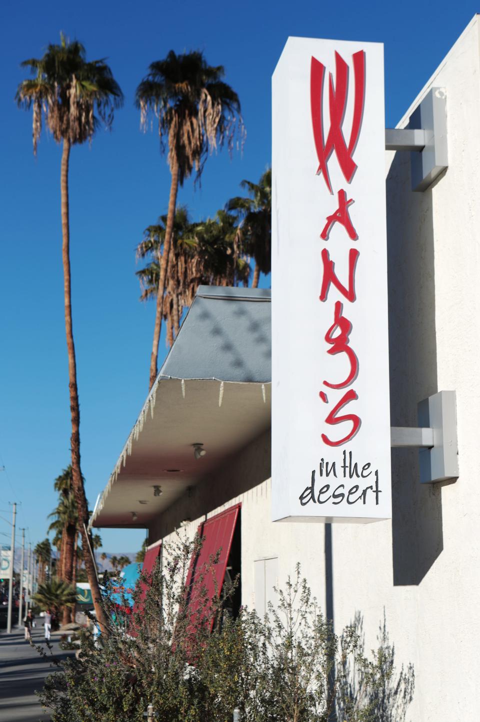 An exterior sign at Wang's in the Desert, seen in 2019.