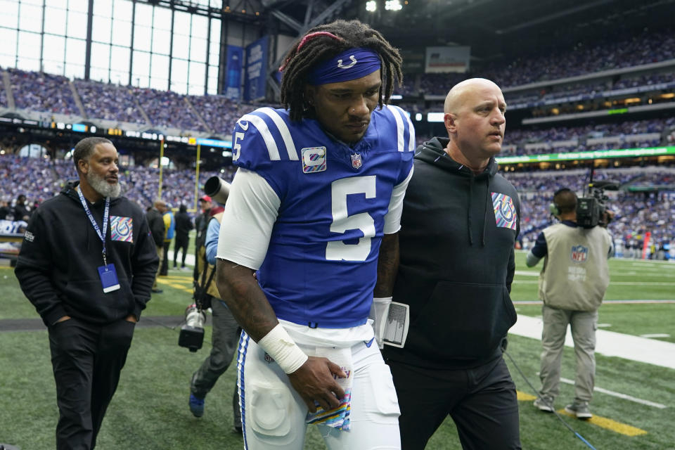 Indianapolis Colts quarterback Anthony Richardson (5) leaves the field after being injured during the first half of an NFL football game against the Tennessee Titans, Sunday, Oct. 8, 2023, in Indianapolis. (AP Photo/Darron Cummings)