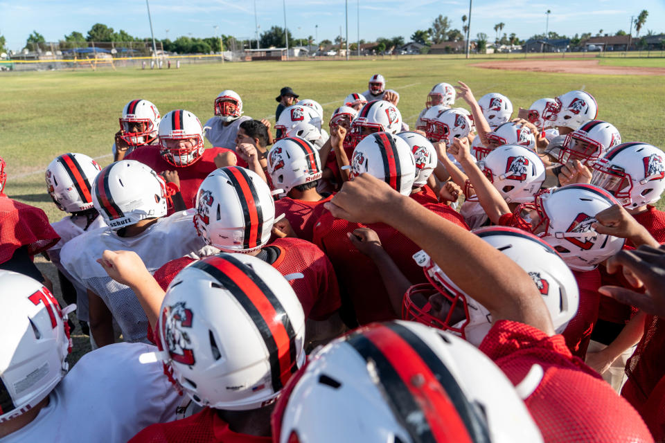 Cortez High School football players attend a practice on campus in Phoenix on Oct. 19, 2022.