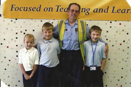 Jeffrey Fowle is pictured with his children, (L-R) Stephanie, 9, Chris, 9, Jeffrey and Alex, 13, in this 2014 handout photo provided by the Fowle family and obtained by Reuters on August 12, 2014. REUTERS/Fowle Family/Handout via Reuters