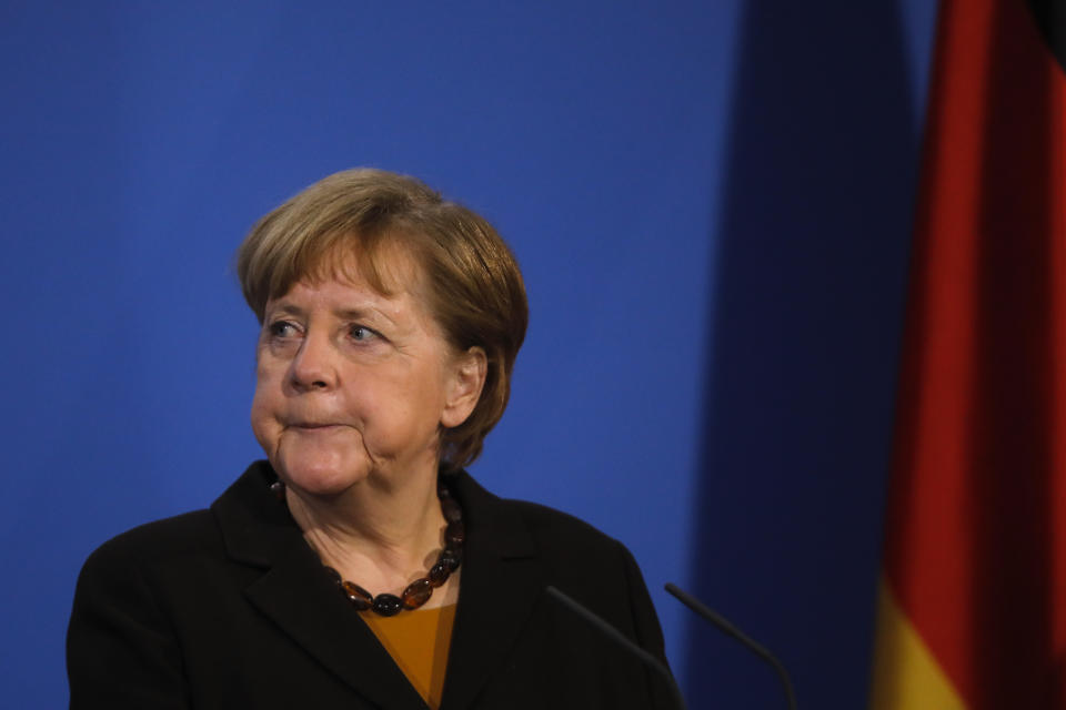 German Chancellor Angela Merkel briefs the media after a virtual meeting with federal state governors at the chancellery in Berlin, Germany, Tuesday, March 30, 2021. German health officials agreed Tuesday to restrict the use of AstraZeneca's coronavirus vaccine in people under 60 amid fresh concern over unusual blood clots reported from those who received the shots. (AP Photo/Markus Schreiber, pool)