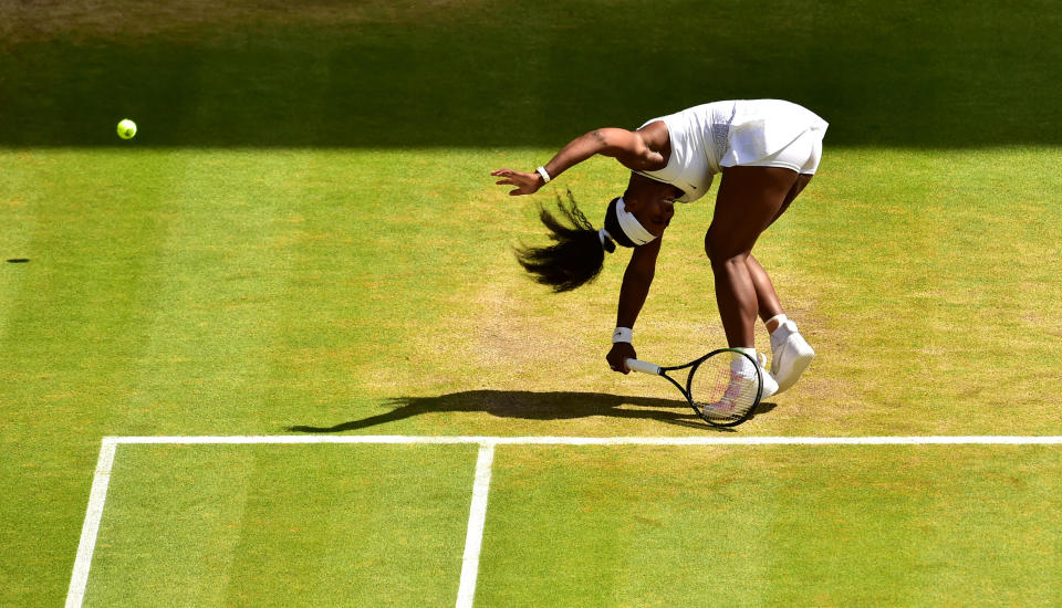 Serena Williams in action during her match against Garbine Muguruza in the ladies singles final on day Twelve of the Wimbledon Championships at the All England Lawn Tennis and Croquet Club, Wimbledon.