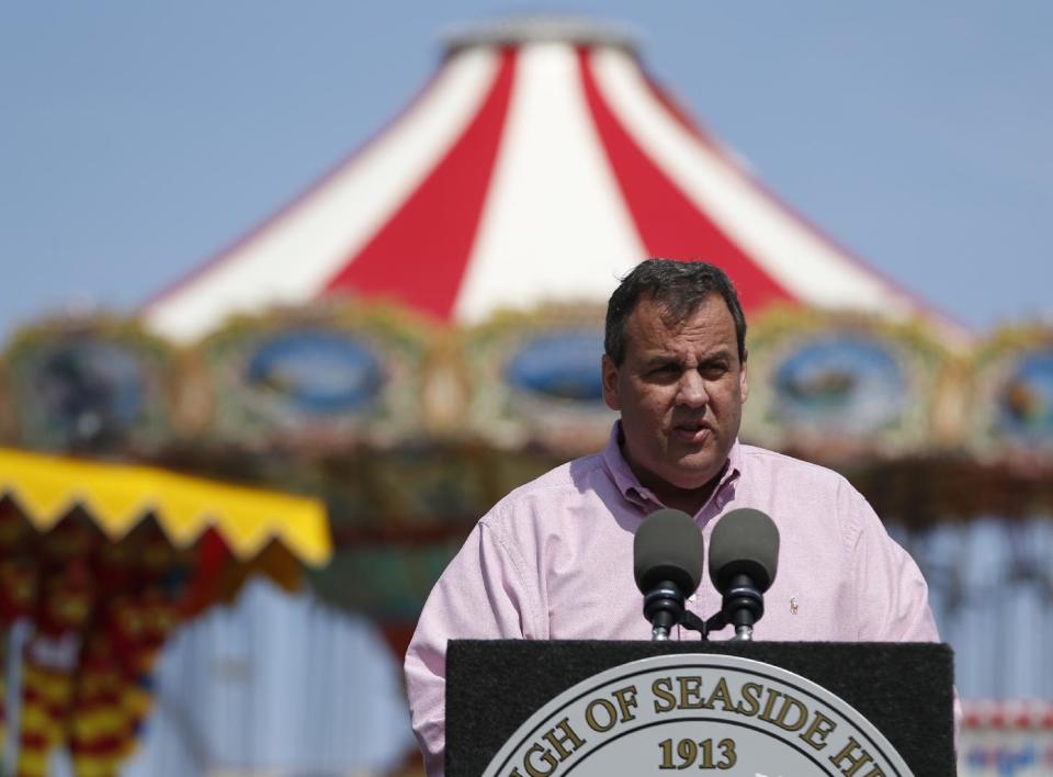 New Jersey Gov. Chris Christie talks during a news conference following a visit to the Seaside Heights boardwalk, Friday, April 25, 2014, in Seaside Heights, N.J. Christie visited the boardwalk to see progress following last September's massive fire that burned down the Seaside Park side of the boardwalk. Previously, the boardwalk had been rebuilt following Superstorm Sandy. Investigators determined the fire started in wiring under the boardwalk in Seaside Park that had been damaged by exposure to storm water from Sandy. (AP Photo/Julio Cortez)