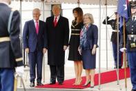 U.S. President Donald Trump and first lady Melania Trump welcome Australian Prime Minister Malcolm Turnbull (L) and Lucy Turnbull (R) to the White House in Washington, U.S., February 23, 2018. REUTERS/Jonathan Ernst