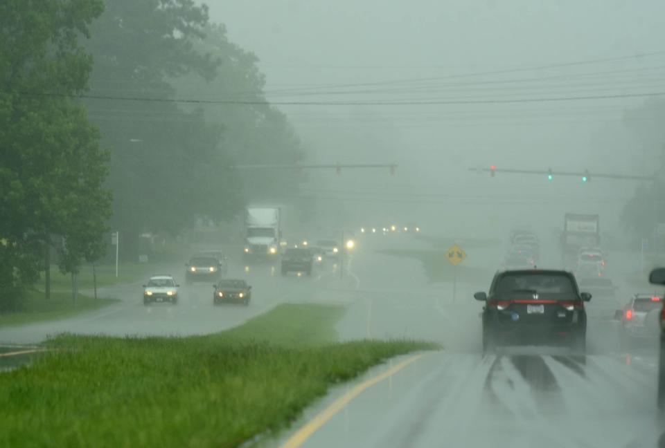 A StarNews file photo shows traffic moving down Carolina Beach Road during heavy rains.