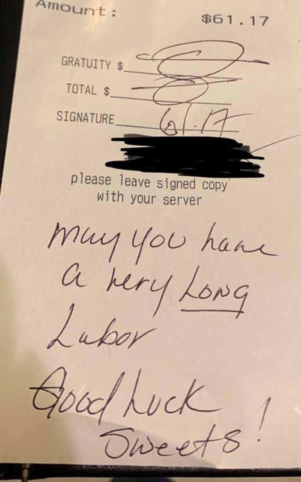 A receipt with a note which reads, 'may you have a very long labour'. It was given to a pregnant waitress.