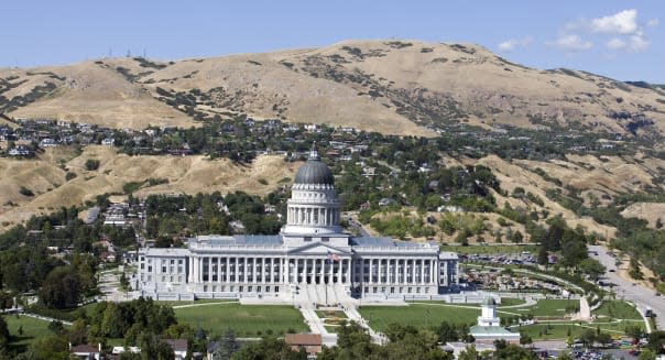 Aerial of the Utah Stat Capitol in Salt Lake City Taken from a helicopter on a crystal clear blue sky day