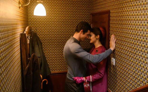 Anthony (Callum Turner) and Jennifer in one of her meticulous outfits, featuring the coat with the stunning back.<p>Photo: Parisa Taghizadeh/Courtesy of Netflix</p>