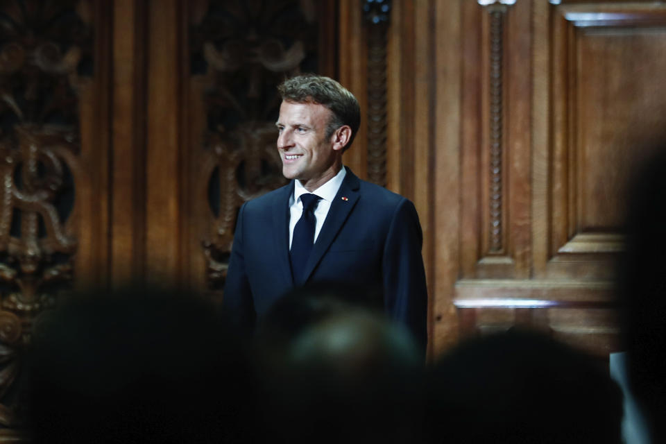 French President Emmanuel Macron arrives at the Sorbonne University in Paris, to delivers a speech at the opening of the back-to-school meeting of rectors, as France is struggling to recruit teachers, Thursday, Aug. 25, 2022. Emmanuel Macron will later head to Algeria for a three-day official visit aimed at addressing two major challenges: boosting future economic relations while seeking to heal wounds inherited from the colonial era, 60 years after the North African country won its independence from France. (Mohammed Badra, pool via AP)