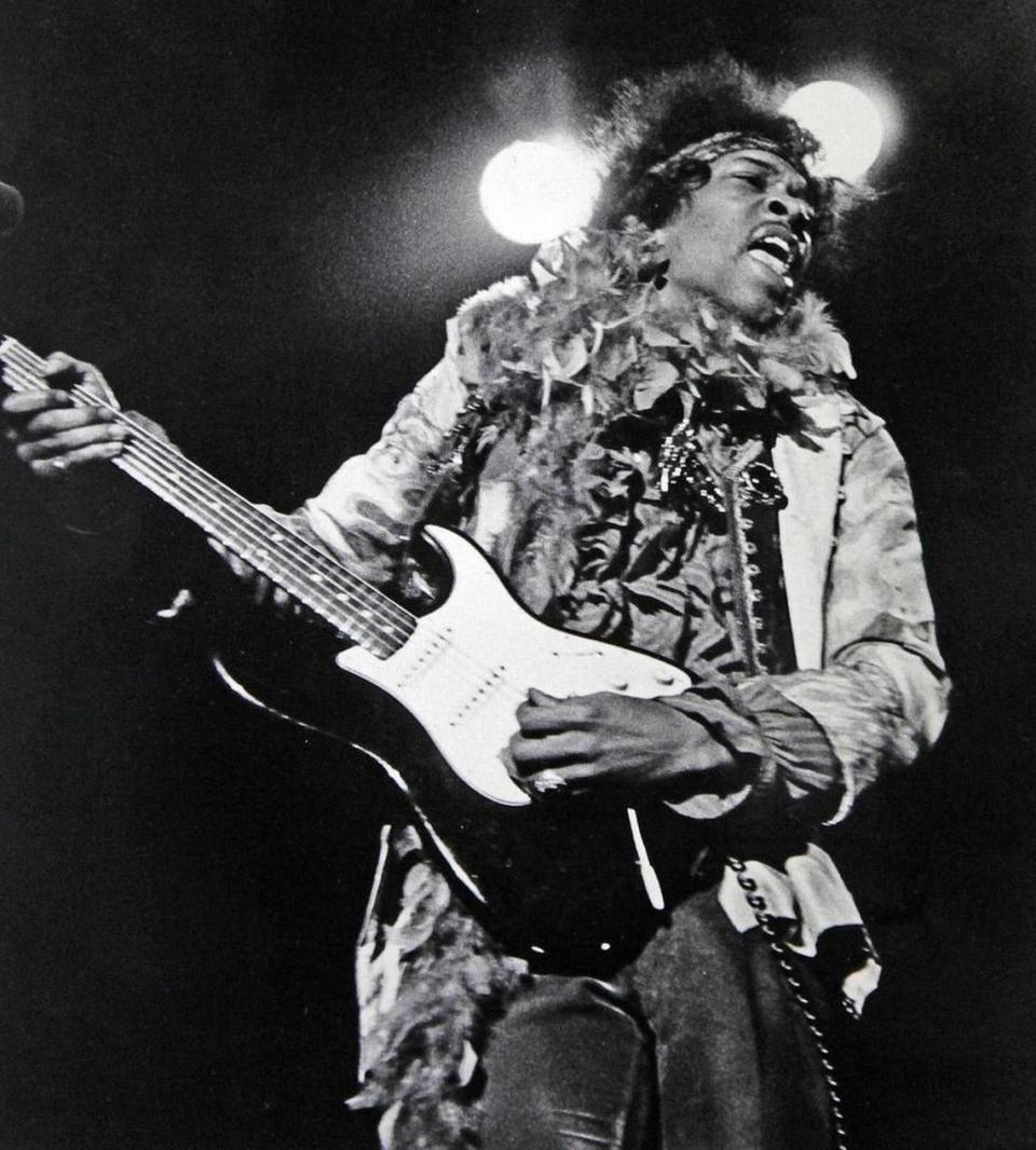 In this June 18, 1967 file photo, Jimi Hendrix performs at the Monterey Pop Festival in Monterey, Calif. Before Burning Man and Bonnaroo, Coachella and Lollapalooza, Glastonbury and Governors Island, there was Monterey Pop. AP