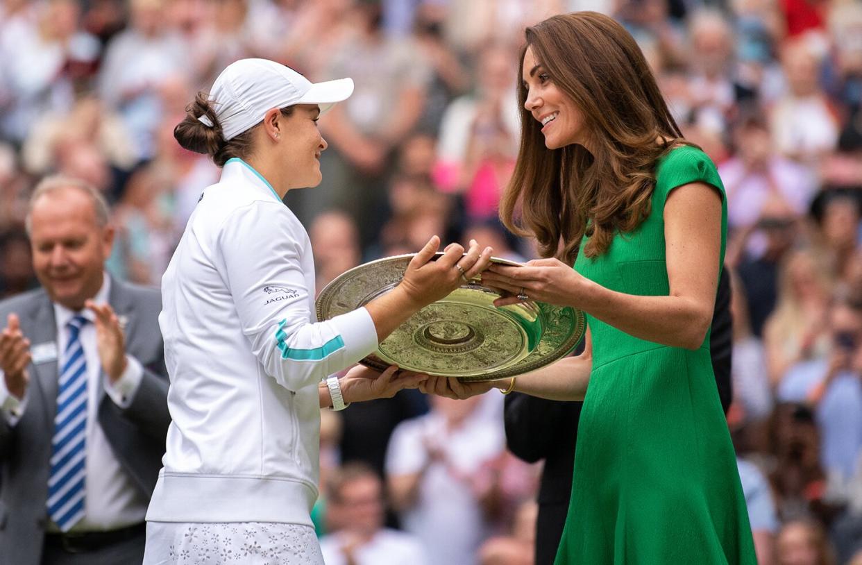 Ashleigh Barty of Australia is presented with the Venus Rosewater Dish trophy by HRH Catherine, The Duchess of Cambridge after winning her Ladies' Singles Final match against Karolina Pliskova of The Czech Republic on Day Twelve of The Championships - Wimbledon 2021