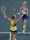 Czech Republic's Barbora Krejcikova and Katerina Siniakova, right, celebrate after defeating Japan's Shuko Aoyama and Ena Shibahara in the women's doubles final at the Australian Open tennis championship in Melbourne, Australia, Sunday, Jan. 29, 2023. (AP Photo/Ng Han Guan)