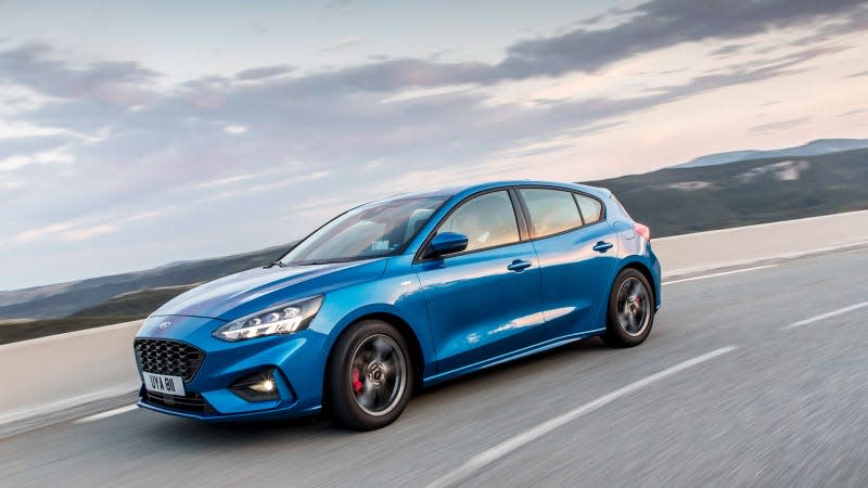 A photo of a blue Ford Focus hatchback. 