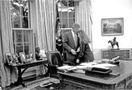 <p>Bill Clinton's daughter, Chelsea, visits her father in his office, A.K.A. the Oval Office, during his term as President in 1993. </p>