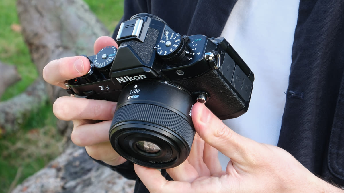  Nikon Zf being held in reviewer's hands. 
