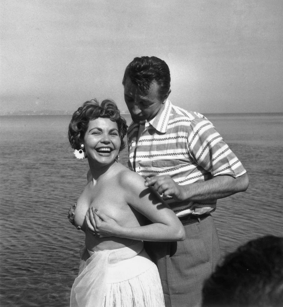 Simone Silva and Robert Mitchum, 1954