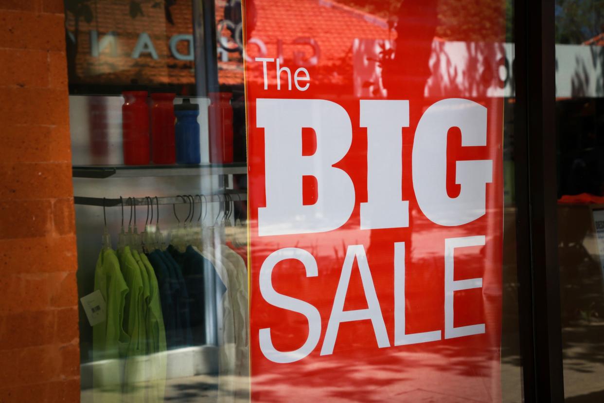 'The Big Sale' sign in store window