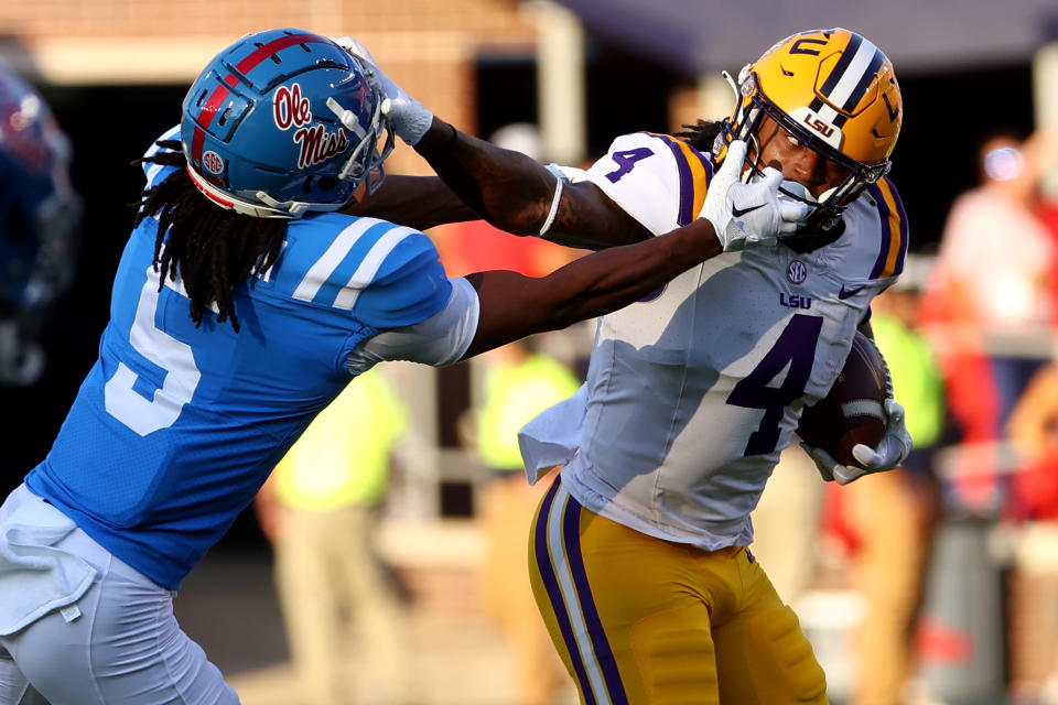 The Rebels and Tigers will meet Saturday night in Death Valley with plenty on the line. (Jamie Schwaberow/Getty Images)